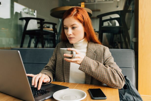 Woman working as a digital nomad in a cafe